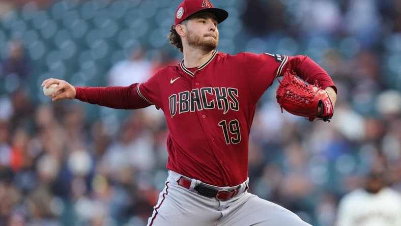 Jul 31, 2023; San Francisco, California, USA; Arizona Diamondbacks starting pitcher Ryne Nelson (19) throws a pitch during the first inning against the San Francisco Giants at Oracle Park. Mandatory Credit: Sergio Estrada-USA TODAY Sports