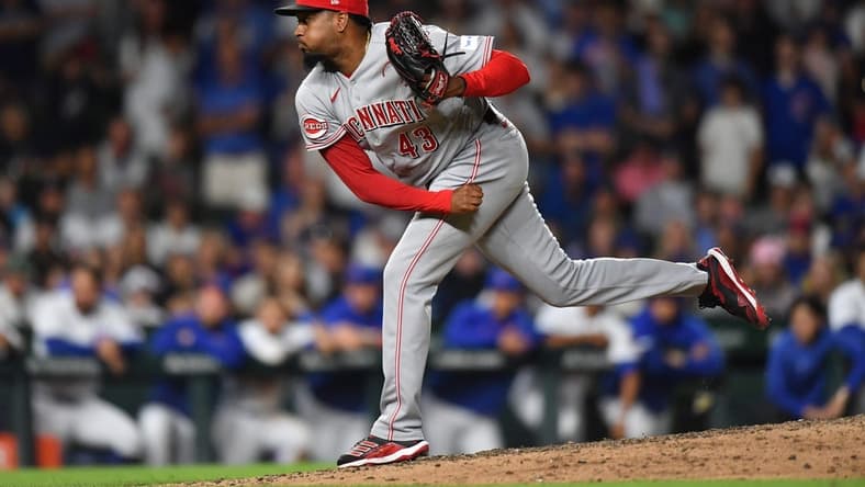 Jul 31, 2023; Chicago, Illinois, USA; Cincinnati Reds relief pitcher Alexis Diaz (43) pitches during the ninth inning against the Chicago Cubs at Wrigley Field. Mandatory Credit: Patrick Gorski-USA TODAY Sports