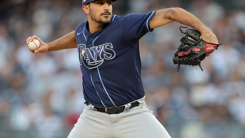 Aug 1, 2023; Bronx, New York, USA; Tampa Bay Rays starting pitcher Zach Eflin (24) pitches against the New York Yankees during the first inning at Yankee Stadium. Mandatory Credit: Brad Penner-USA TODAY Sports