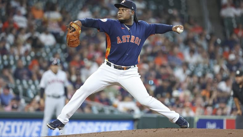 Aug 1, 2023; Houston, Texas, USA; Houston Astros starting pitcher Framber Valdez (59) delivers a pitch during the first inning against the Cleveland Guardians at Minute Maid Park. Mandatory Credit: Troy Taormina-USA TODAY Sports