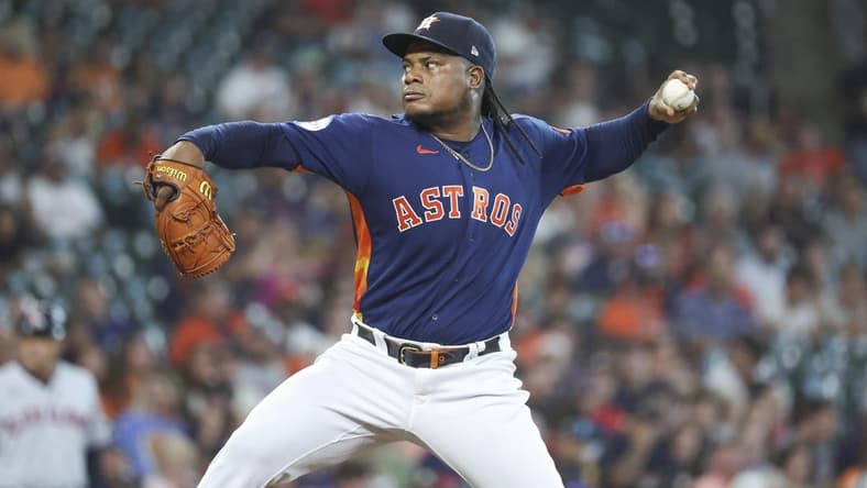 Aug 1, 2023; Houston, Texas, USA; Houston Astros starting pitcher Framber Valdez (59) delivers a pitch during the first inning against the Cleveland Guardians at Minute Maid Park. Mandatory Credit: Troy Taormina-USA TODAY Sports