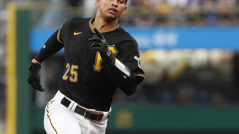Aug 1, 2023; Pittsburgh, Pennsylvania, USA; Pittsburgh Pirates catcher Endy Rodriguez (25) runs to third base with an RBI triple against the Detroit Tigers during the second inning at PNC Park. Mandatory Credit: Charles LeClaire-USA TODAY Sports