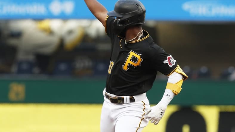 Aug 1, 2023; Pittsburgh, Pennsylvania, USA;  Pittsburgh Pirates second baseman Liover Peguero (60) reacts on a two run home run against the Detroit Tigers during the second inning at PNC Park. Mandatory Credit: Charles LeClaire-USA TODAY Sports