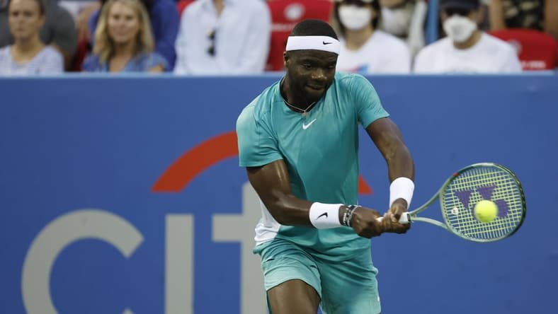 Aug 1, 2023; Washington, D.C., USA; Frances Tiafoe (USA) hits a backhand against Aslan Karatsev (not pictured) on day four of the Mubadala Citi DC Open at Fitzgerald Tennis Stadium. Mandatory Credit: Geoff Burke-USA TODAY Sports
