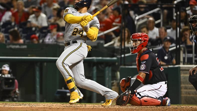 Aug 1, 2023; Washington, District of Columbia, USA; Milwaukee Brewers catcher William Contreras (24) hits a RBI double against the Washington Nationals during the seventh inning at Nationals Park. Mandatory Credit: Brad Mills-USA TODAY Sports
