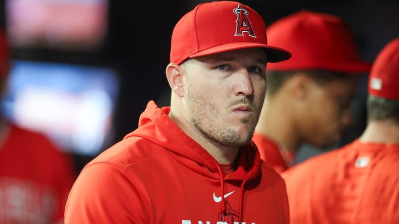 Aug 1, 2023; Atlanta, Georgia, USA; Los Angeles Angels outfielder Mike Trout (27) in the dugout against the Atlanta Braves in the seventh inning at Truist Park. Mandatory Credit: Brett Davis-USA TODAY Sports