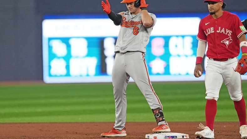 Jul 31, 2023; Toronto, Ontario, CAN; Baltimore Orioles designated hitter Ryan Mountcastle (6)  celebrates hitting a double against the Toronto Blue Jays during the eighth inning at Rogers Centre. Mandatory Credit: Nick Turchiaro-USA TODAY Sports