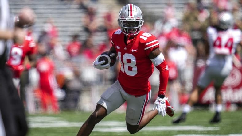 Apr 15, 2023; Columbus, Ohio, United States; Ohio State Buckeyes wide receiver Marvin Harrison Jr. (18) sprints down the side of the field during the first quarter of the Ohio State Buckeyes spring game at Ohio Stadium on Saturday morning. Mandatory Credit: Joseph Scheller-The Columbus Dispatch