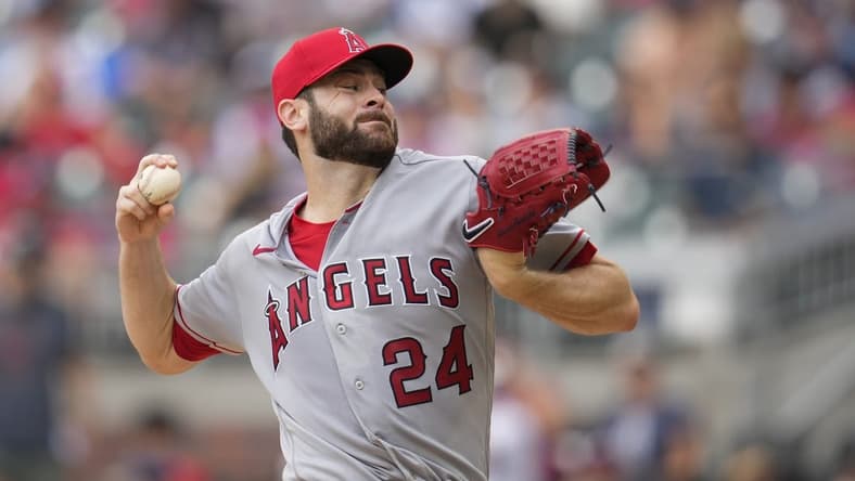 Aug 2, 2023; Cumberland, Georgia, USA; Los Angeles Angels starting pitcher Lucas Giolito (24) pitches against the Atlanta Braves during the first inning at Truist Park. Mandatory Credit: Dale Zanine-USA TODAY Sports