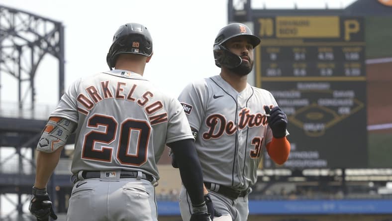 Aug 2, 2023; Pittsburgh, Pennsylvania, USA; Detroit Tigers first baseman Spencer Torkelson (20) congratulates center fielder Riley Greene (31) crossing home plate on a solo home run against the Pittsburgh Pirates during the first inning at PNC Park. Mandatory Credit: Charles LeClaire-USA TODAY Sports
