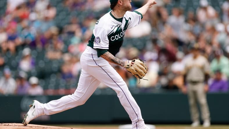 Aug 2, 2023; Denver, Colorado, USA; Colorado Rockies starting pitcher Kyle Freeland (21) pitches in the first inning against the San Diego Padres at Coors Field. Mandatory Credit: Isaiah J. Downing-USA TODAY Sports