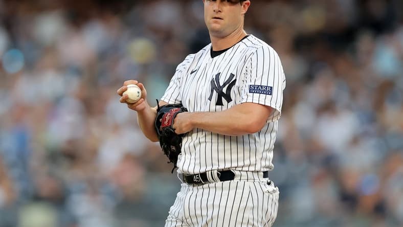 Aug 2, 2023; Bronx, New York, USA; New York Yankees starting pitcher Gerrit Cole (45) reacts during the first inning against the Tampa Bay Rays at Yankee Stadium. Mandatory Credit: Brad Penner-USA TODAY Sports