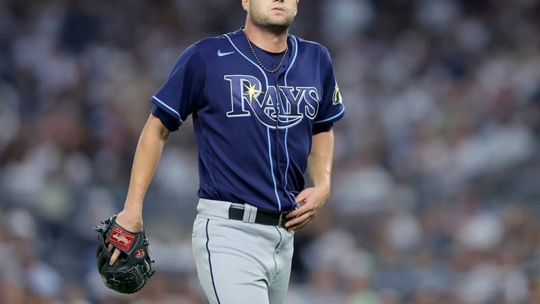 Aug 2, 2023; Bronx, New York, USA; Tampa Bay Rays starting pitcher Shane McClanahan (18) reacts during the fourth inning against the New York Yankees at Yankee Stadium. Mandatory Credit: Brad Penner-USA TODAY Sports