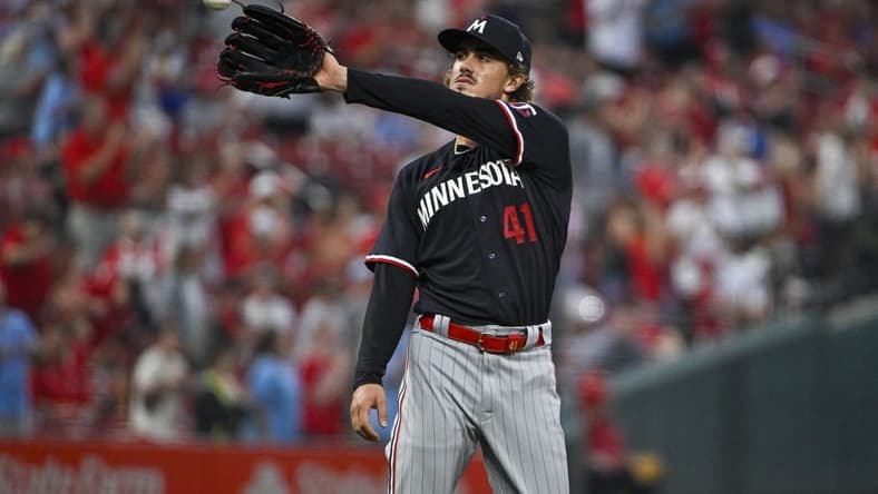 Aug 2, 2023; St. Louis, Missouri, USA; Minnesota Twins starting pitcher Joe Ryan (41) catches a new baseball after giving up a two run home run to St. Louis Cardinals center fielder Lars Nootbaar (not pictured) during the second inning at Busch Stadium. Mandatory Credit: Jeff Curry-USA TODAY Sports