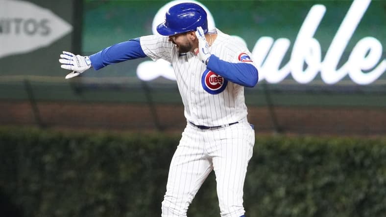 Aug 2, 2023; Chicago, Illinois, USA; Chicago Cubs center fielder Mike Tauchman (40) gestures after hitting a one run double against the Cincinnati Reds during the sixth inning at Wrigley Field. Mandatory Credit: David Banks-USA TODAY Sports
