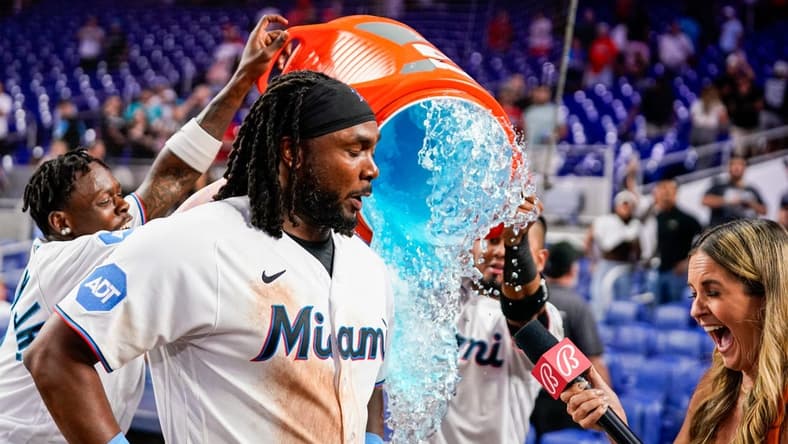 Aug 2, 2023; Miami, Florida, USA; Miami Marlins first baseman Josh Bell (9) is given gatorade bath after defeating the Philadelphia Phillies at loanDepot Park. Mandatory Credit: Rich Storry-USA TODAY Sports