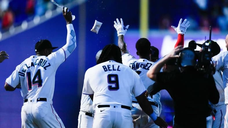 Aug 2, 2023; Miami, Florida, USA; Miami Marlins celebrates after defeating the Philadelphia Phillies during the twelfth inning at loanDepot Park. Mandatory Credit: Rich Storry-USA TODAY Sports