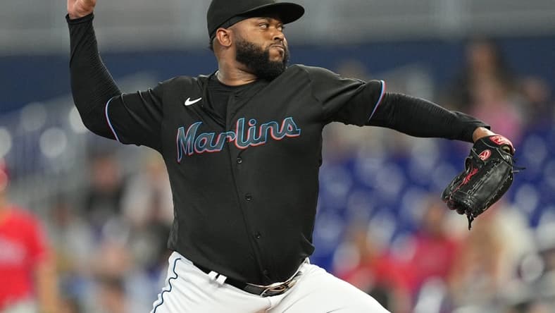 Aug 3, 2023; Miami, Florida, USA; Miami Marlins starting pitcher Johnny Cueto (47) pitches against the Philadelphia Phillies at loanDepot Park. Mandatory Credit: Jim Rassol-USA TODAY Sports