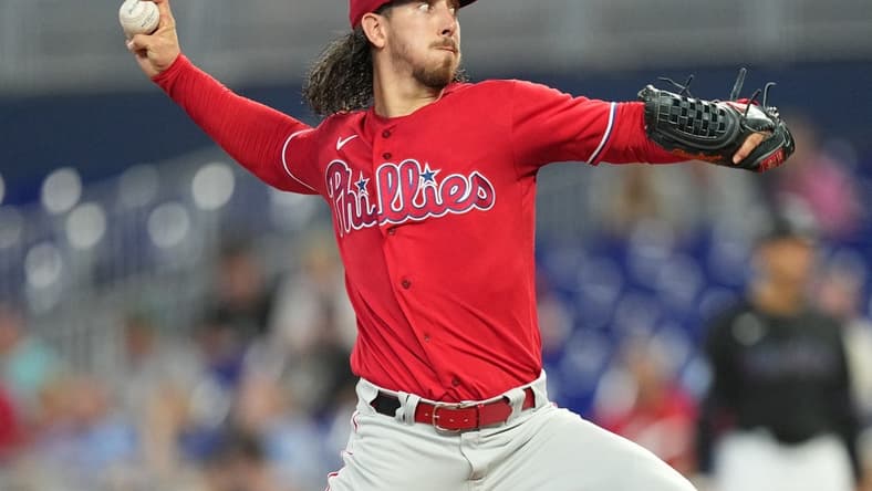 Aug 3, 2023; Miami, Florida, USA; Philadelphia Phillies pitcher Michael Lorenzen (22) pitches against the Miami Marlins at loanDepot Park. Mandatory Credit: Jim Rassol-USA TODAY Sports