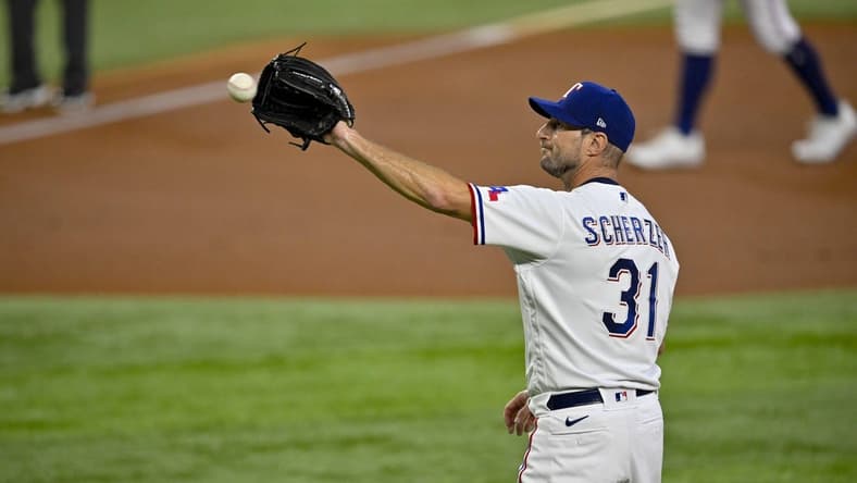 Aug 3, 2023; Arlington, Texas, USA; Texas Rangers starting pitcher Max Scherzer (31) pitches against the Chicago White Sox during the first inning at Globe Life Field. Mandatory Credit: Jerome Miron-USA TODAY Sports