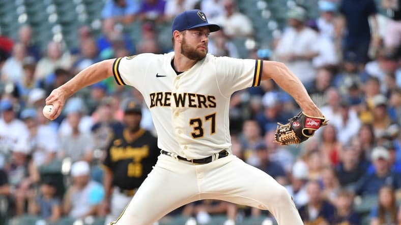 Aug 3, 2023; Milwaukee, Wisconsin, USA; Milwaukee Brewers starting pitcher Adrian Houser (37) delivers a pitch in the first inning against the Pittsburgh Pirates at American Family Field. Mandatory Credit: Michael McLoone-USA TODAY Sports