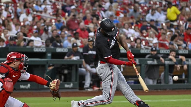Aug 3, 2023; St. Louis, Missouri, USA;  Minnesota Twins center fielder Michael A. Taylor (2) hits a two run home run against the St. Louis Cardinals during the second inning at Busch Stadium. Mandatory Credit: Jeff Curry-USA TODAY Sports