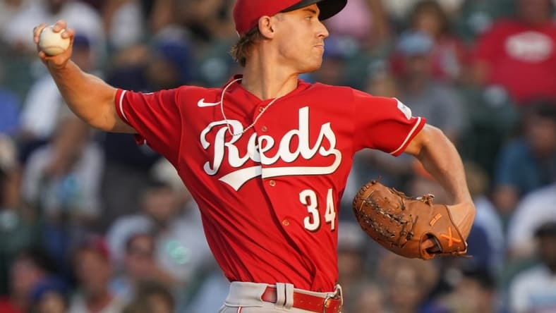 Aug 3, 2023; Chicago, Illinois, USA; Cincinnati Reds starting pitcher Luke Weaver (34) throws against the Chicago Cubs during the first inning at Wrigley Field. Mandatory Credit: David Banks-USA TODAY Sports