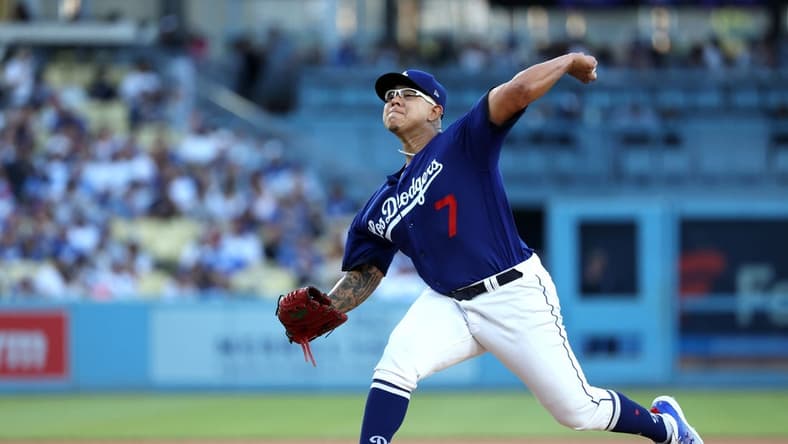 Aug 3, 2023; Los Angeles, California, USA; Los Angeles Dodgers starting pitcher Julio Urias (7) pitches during the first inning against the Oakland Athletics at Dodger Stadium. Mandatory Credit: Kiyoshi Mio-USA TODAY Sports
