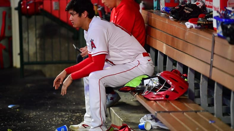 August 3, 2023; Anaheim, California, USA; Los Angeles Angels starting pitcher Shohei Ohtani (17) watches game action against the Seattle Mariners during the fifth inning at Angel Stadium. Mandatory Credit: Gary A. Vasquez-USA TODAY Sports