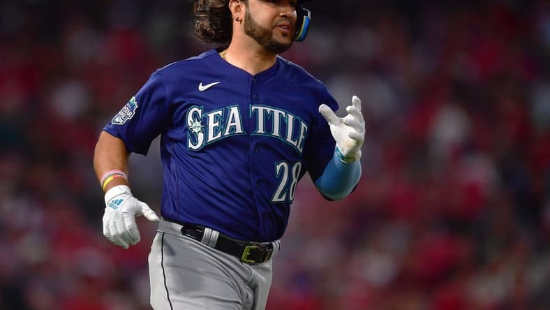 August 3, 2023; Anaheim, California, USA; Seattle Mariners third baseman Eugenio Suarez (28) runs after hitting a solo home run against the Los Angeles Angels during the sixth inning at Angel Stadium. Mandatory Credit: Gary A. Vasquez-USA TODAY Sports