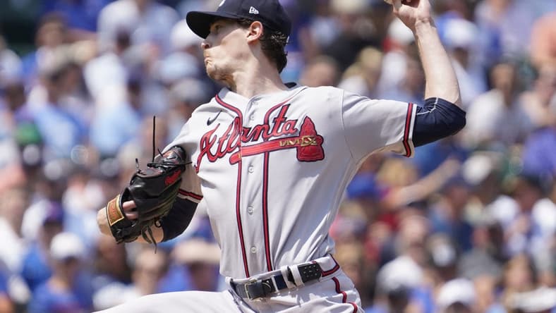 Aug 4, 2023; Chicago, Illinois, USA; Atlanta Braves starting pitcher Max Fried (54) throws the ball against the Chicago Cubs during the first inning at Wrigley Field. Mandatory Credit: David Banks-USA TODAY Sports