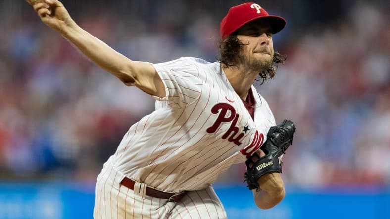 Aug 4, 2023; Philadelphia, Pennsylvania, USA; Philadelphia Phillies starting pitcher Aaron Nola (27) throws a pitch during the third inning against the Kansas City Royals at Citizens Bank Park. Mandatory Credit: Bill Streicher-USA TODAY Sports
