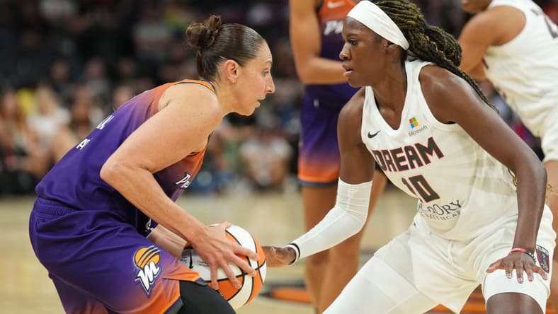 Aug 3, 2023; Phoenix, Arizona, USA; Atlanta Dream guard Rhyne Howard (10) plays defense against Phoenix Mercury guard Diana Taurasi (3) during the game at at Footprint Center. Mandatory Credit: Joe Camporeale-USA TODAY Sports