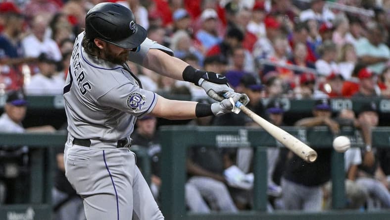 Aug 4, 2023; St. Louis, Missouri, USA;  Colorado Rockies second baseman Brendan Rodgers (7) hits a one run single against the St. Louis Cardinals during the second inning at Busch Stadium. Mandatory Credit: Jeff Curry-USA TODAY Sports