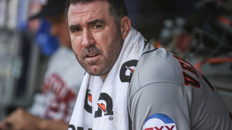 Aug 5, 2023; Bronx, New York, USA; Houston Astros starting pitcher Justin Verlander (35) sits in the dugout in the sixth inning against the New York Yankees at Yankee Stadium. Mandatory Credit: Wendell Cruz-USA TODAY Sports