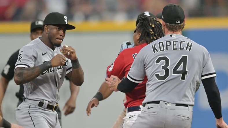 Aug 5, 2023; Cleveland, Ohio, USA; Chicago White Sox shortstop Tim Anderson (7) raises his fists to fight Cleveland Guardians third baseman Jose Ramirez (11) during the sixth inning at Progressive Field. Mandatory Credit: Ken Blaze-USA TODAY Sports