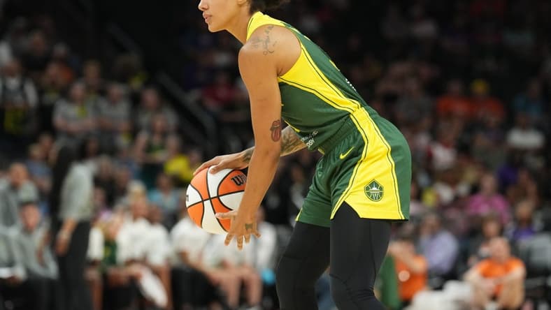Aug 5, 2023; Phoenix, Arizona, USA; Seattle Storm forward Gabby Williams (5) dribbles against the Phoenix Mercury during the second half at Footprint Center. Mandatory Credit: Joe Camporeale-USA TODAY Sports