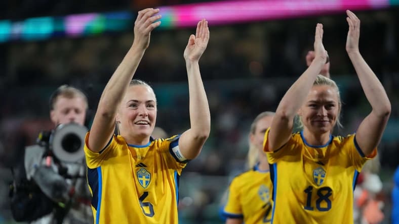 Aug 6, 2023; Melbourne, AUS; Sweden defender Magdalena Eriksson (6) and forward Fridolina Rolfo (18) celebrate after defeating the United States in the penalty kick shootout during a Round of 16 match in the 2023 FIFA Women's World Cup at Melbourne Rectangular Stadium. Mandatory Credit: Jenna Watson-USA TODAY Sports
