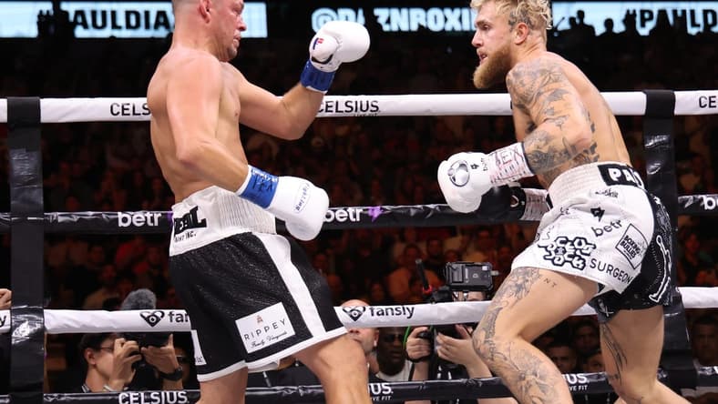 Aug 5, 2023; Dallas, Texas, USA;  Jake Paul (right) fights  against Nate Diaz in a boxing match at American Airlines Center. Mandatory Credit: Kevin Jairaj-USA TODAY Sports
