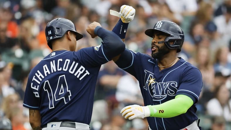 Aug 6, 2023; Detroit, Michigan, USA; Tampa Bay Rays first baseman Yandy Diaz (2) receives congratulations from catcher Christian Bethancourt (14) after he hits a two run home run in the second inning against the Detroit Tigers at Comerica Park. Mandatory Credit: Rick Osentoski-USA TODAY Sports