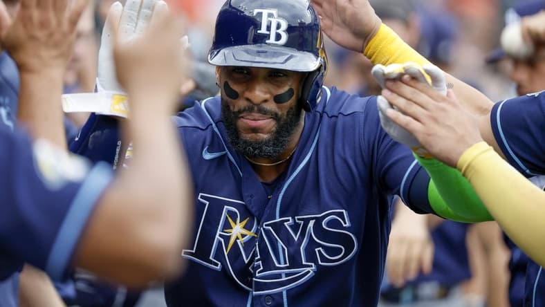 Aug 6, 2023; Detroit, Michigan, USA; Tampa Bay Rays first baseman Yandy Diaz (2) receives congratulations from teammates after he hits a two run home run in the second inning against the Detroit Tigers at Comerica Park. Mandatory Credit: Rick Osentoski-USA TODAY Sports