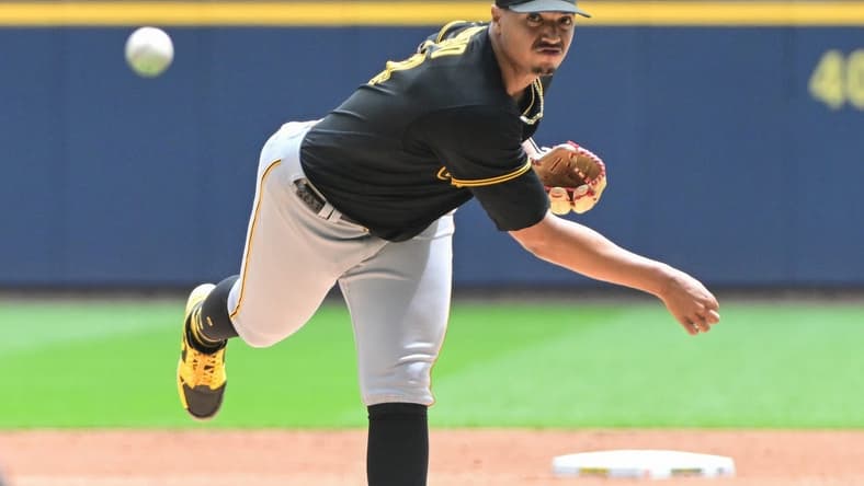 Aug 6, 2023; Milwaukee, Wisconsin, USA; Pittsburgh Pirates pitcher Johan Oviedo (24) pitches against the Milwaukee Brewers in the first inning at American Family Field. Mandatory Credit: Benny Sieu-USA TODAY Sports