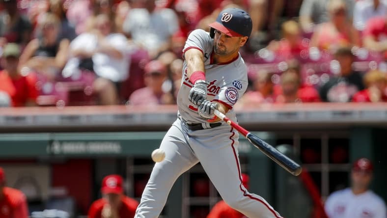 Aug 6, 2023; Cincinnati, Ohio, USA; Washington Nationals second baseman Jake Alu (39) hits a single against the Cincinnati Reds in the first inning at Great American Ball Park. Mandatory Credit: Katie Stratman-USA TODAY Sports