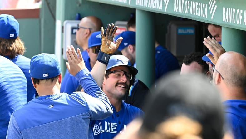 Aug 6, 2023; Boston, Massachusetts, USA; Toronto Blue Jays second baseman Davis Schneider (36) celebrates a two run home run against the Boston Red Sox during the fourth inning at Fenway Park. Mandatory Credit: Eric Canha-USA TODAY Sports