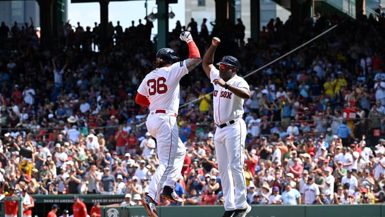 Aug 6, 2023; Boston, Massachusetts, USA; Boston Red Sox first baseman Triston Casas (36) celebrates his home run against the Toronto Blue Jays with third base coach Carlos Febles (53) during the fourth inning at Fenway Park. Mandatory Credit: Eric Canha-USA TODAY Sports
