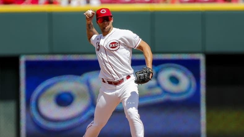 Aug 6, 2023; Cincinnati, Ohio, USA; Cincinnati Reds third baseman Nick Senzel (15) throws to first to get Washington Nationals third baseman Ildemaro Vargas (not pictured) out in the fifth inning at Great American Ball Park. Mandatory Credit: Katie Stratman-USA TODAY Sports