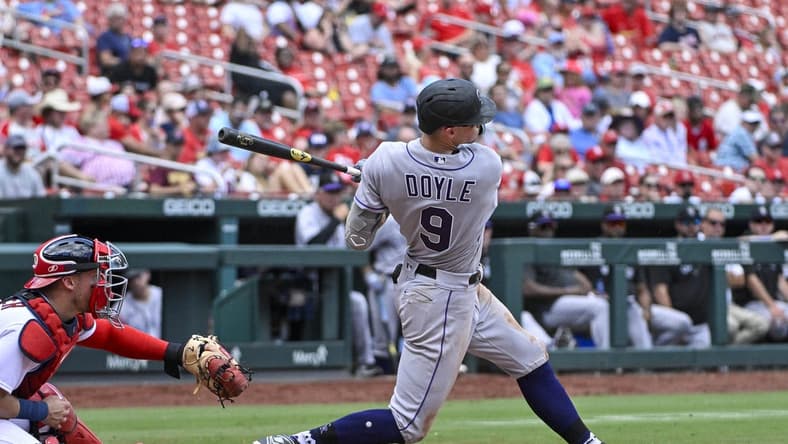 Aug 6, 2023; St. Louis, Missouri, USA;  Colorado Rockies center fielder Brenton Doyle (9) hits a single against the St. Louis Cardinals during the seventh inning at Busch Stadium. Mandatory Credit: Jeff Curry-USA TODAY Sports