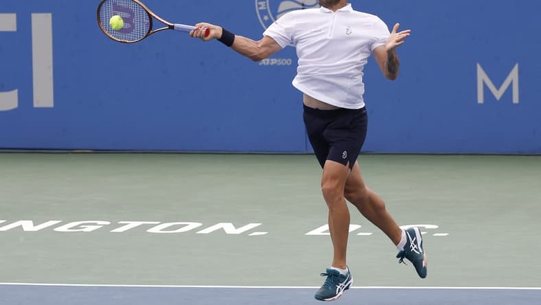Aug 6, 2023; Washington, D.C., USA; Daniel Evans (GBR) hits a forehand against Tallon Griekspoor (NED) (not pictured) in the men's singles final on day nine of the Mubadala Citi DC Open at Fitzgerald Tennis Stadium. Mandatory Credit: Geoff Burke-USA TODAY Sports