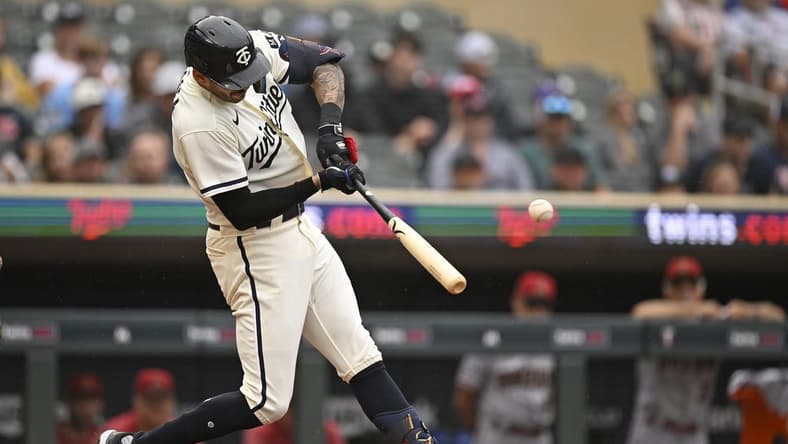 Aug 6, 2023; Minneapolis, Minnesota, USA; Minnesota Twins infielder Carlos Correa (4) collects his 600th and 601st career RBI on a single against the Arizona Diamondbacks during the sixth inning at Target Field. Mandatory Credit: Nick Wosika-USA TODAY Sports