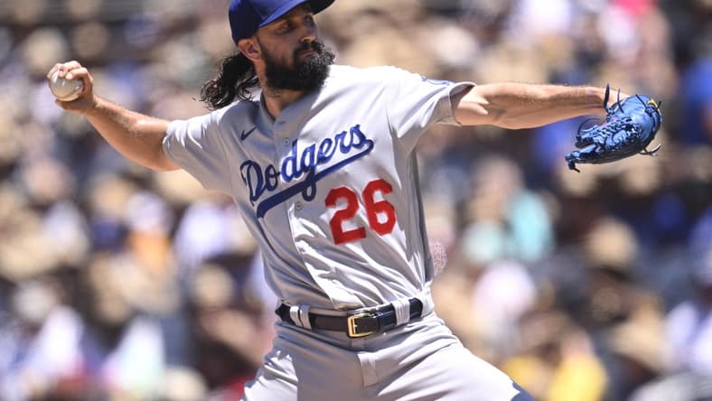 Aug 7, 2023; San Diego, California, USA; Los Angeles Dodgers starting pitcher Tony Gonsolin (26) throws a pitch against the San Diego Padres during the first inning at Petco Park. Mandatory Credit: Orlando Ramirez-USA TODAY Sports